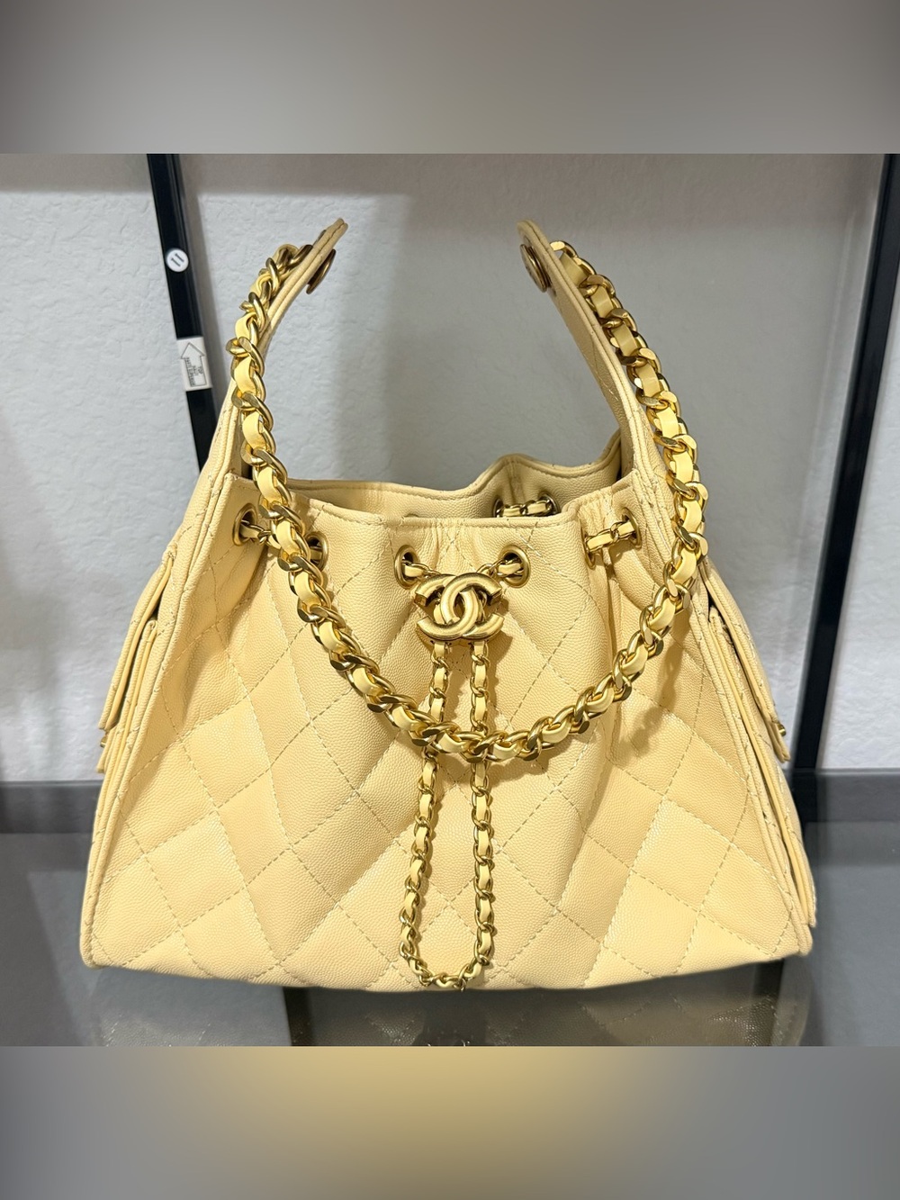 Creamy Yellow Quilted Drawstring Shoulder Bag with Gold Chain